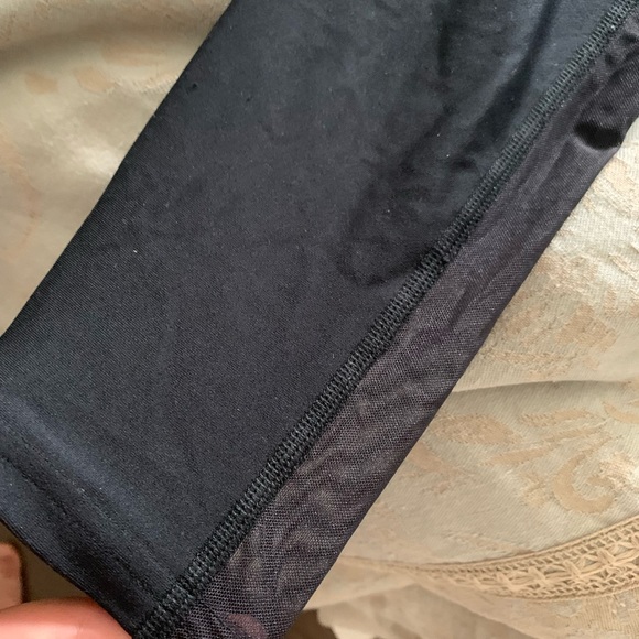 Black Under Armour leggings and mesh at the bottom in great condition. - Picture 2 of 4